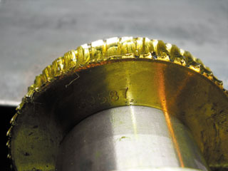 These bronze gear teeth have been worn smooth after prolonged exposure to a lubricant with EP additives. These bronze gear teeth have been worn smooth after prolonged exposure to a lubricant with EP additives.
