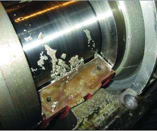 Figure 11. Previously melted Babbitt reformed after restoring lubrication Figure 11. Previously melted Babbitt reformed after restoring lubrication
