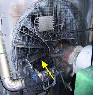 Figure 9. A lube oil pump and radiator (note the dark area where oil and dirt collected during operation) Figure 9. A lube oil pump and radiator (note the dark area where oil and dirt collected during operation)