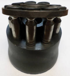 Figure 1. The tolerances between the pistons and barrel on a pressure-compensating, piston-type pump are approximately 0.0004 inch. Figure 1. The tolerances between the pistons and barrel on a pressure-compensating, piston-type pump are approximately 0.0004 inch.