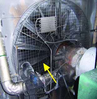 Figure 9. A lube oil pump and radiator (note the dark area where oil and dirt collected during operation)