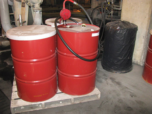 Previously, oil drums at the Georgetown mill were stored in an open building with covers or plastic bagsto keep out contaminants.