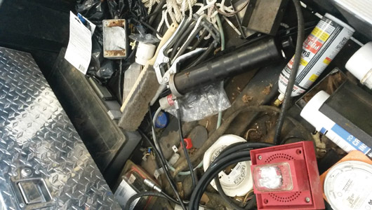 Can you find the grease gun in this picture?