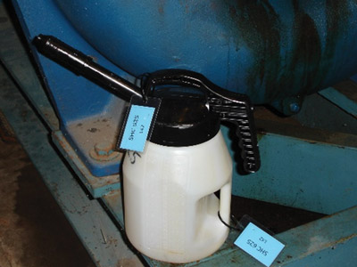 Approved oil-dispensing container