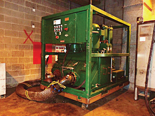 A large pump/filtration unit provided the circulation for the system flush.