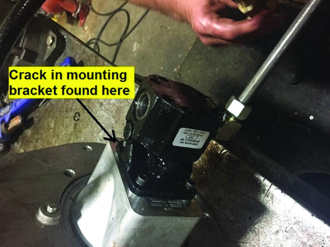 A pump with a cracked mounting bracket led to shaft misalignment and a worn seal.