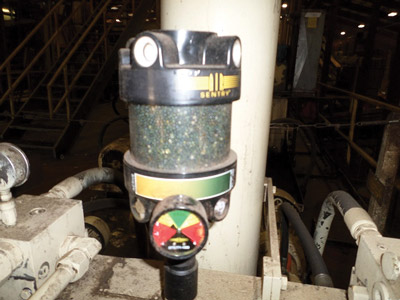 A desiccant breather can be used to remove moisture from the air before it enters the tank.
