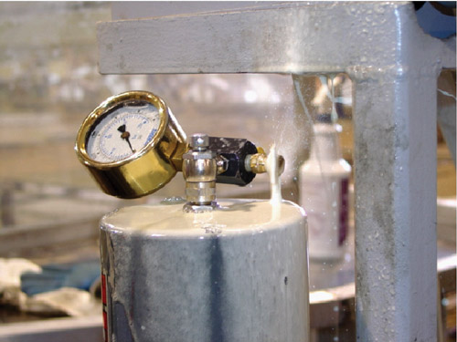 Continuous flow out of a bleed valve may indicate worn piston seals.